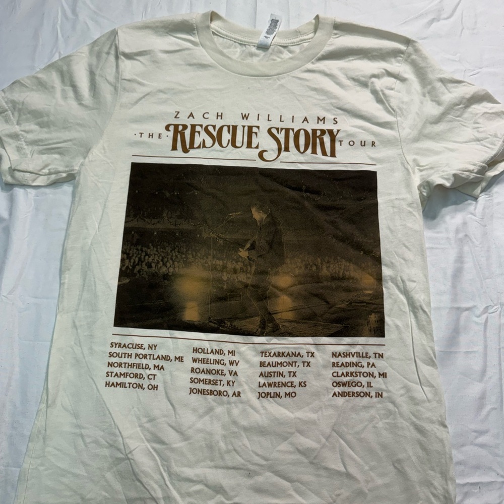 "The Rescue Story" White Graphic Tour T‑Shirt